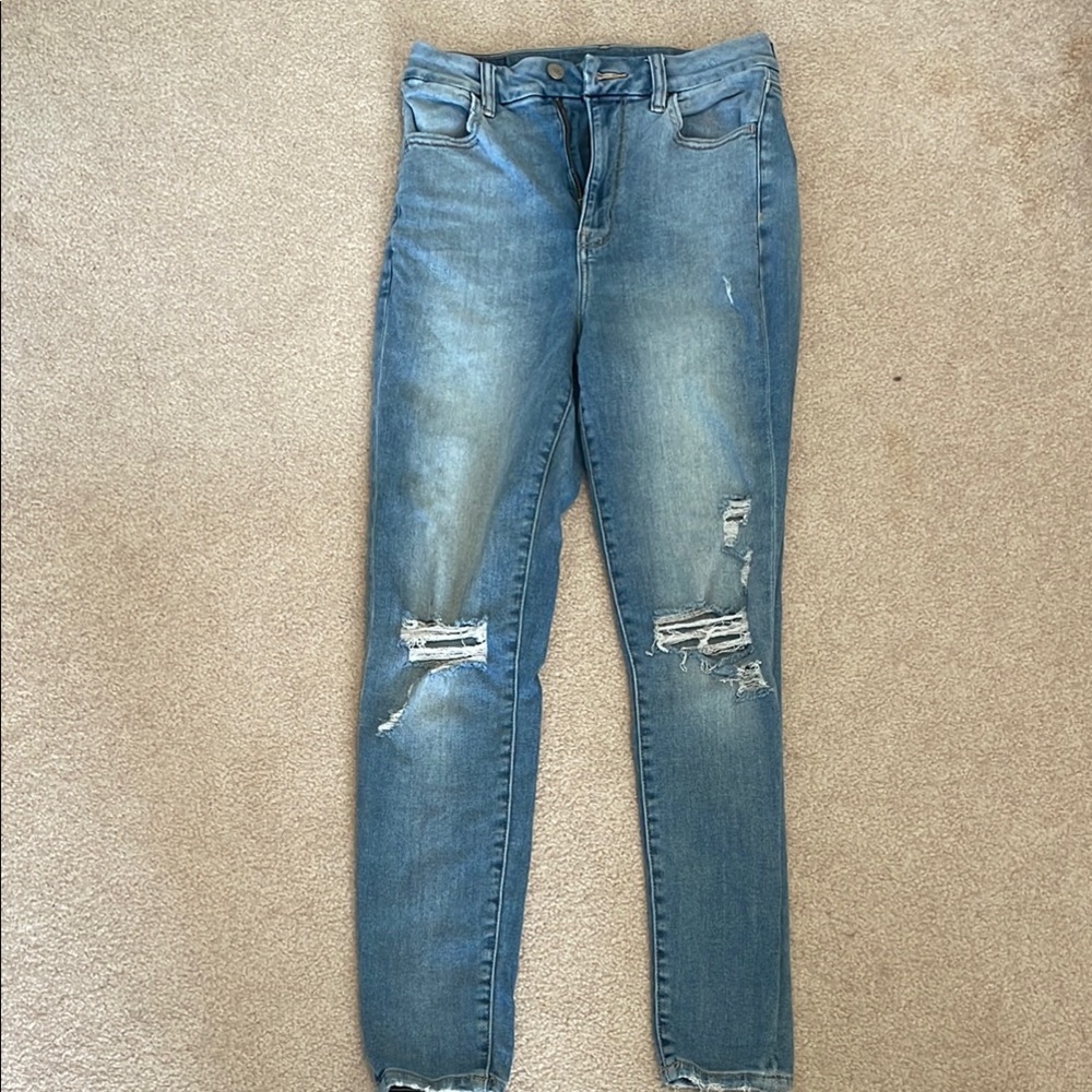 Distressed Blue Denim Jeans